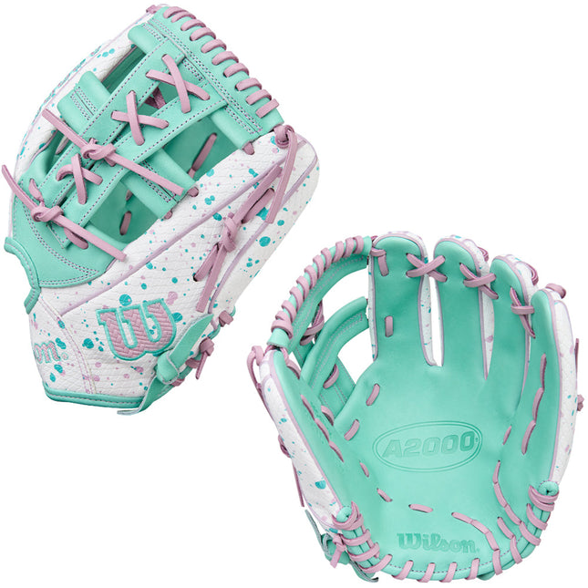 Two turquoise and pink baseball gloves with Wilson branding on a white background