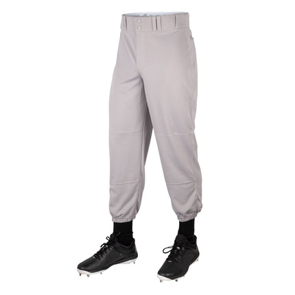 Gray baseball pants worn with black cleats on a white background