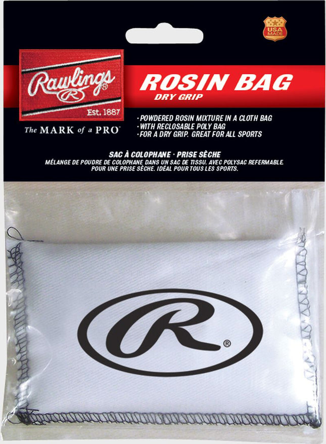 Rawlings Rosin Bag Dry Grip powder bag in a white cloth pouch with a black logo, sealed in clear plastic with a black and red branded header card.