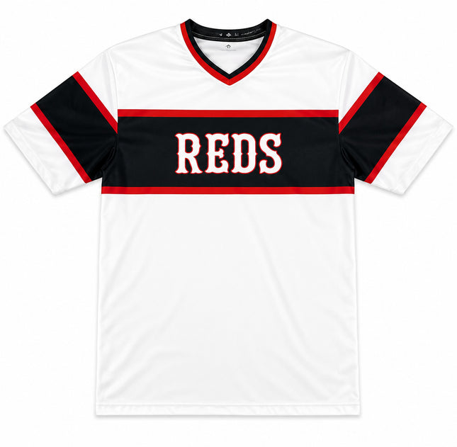 White sports jersey with black sleeves and red accents, featuring the word 'REDS'.
