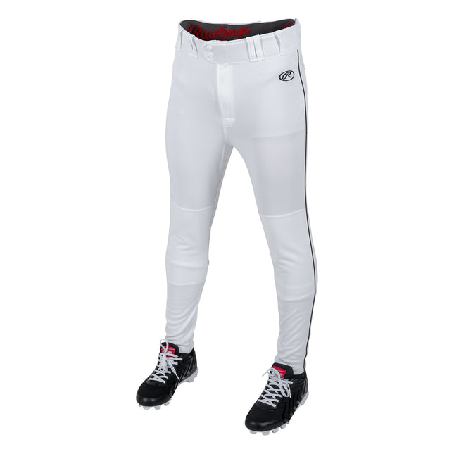 White baseball pants with black cleats on a white background