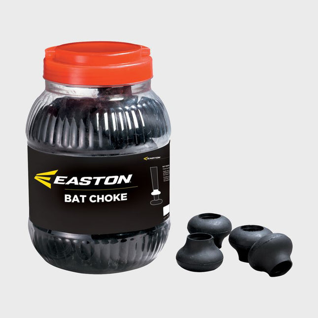 A clear plastic jar of Easton Bat Choke with a bright orange lid and a black label, shown next to four black rubber bat chokes on a light gray background.